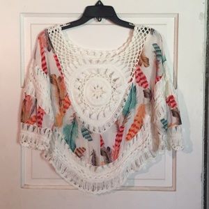 Crochet blouse with feathers